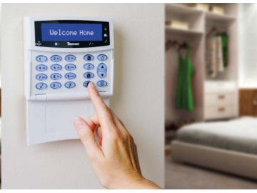 Image of a Texecom keypad with buttons being pressed